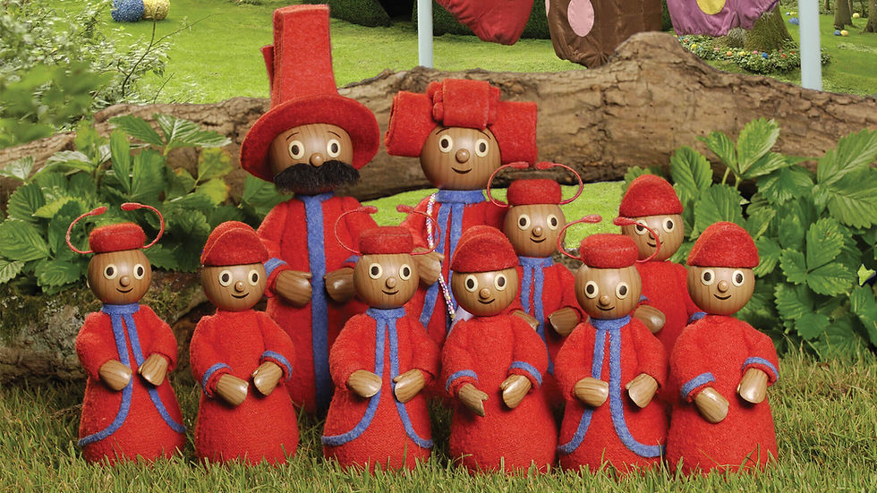 a family of ten little characters wearing red and blue coat and red hats